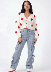 Thumbnail for Pink Seal Soft berry-toned cardigan sweater radiating joy and confidence.