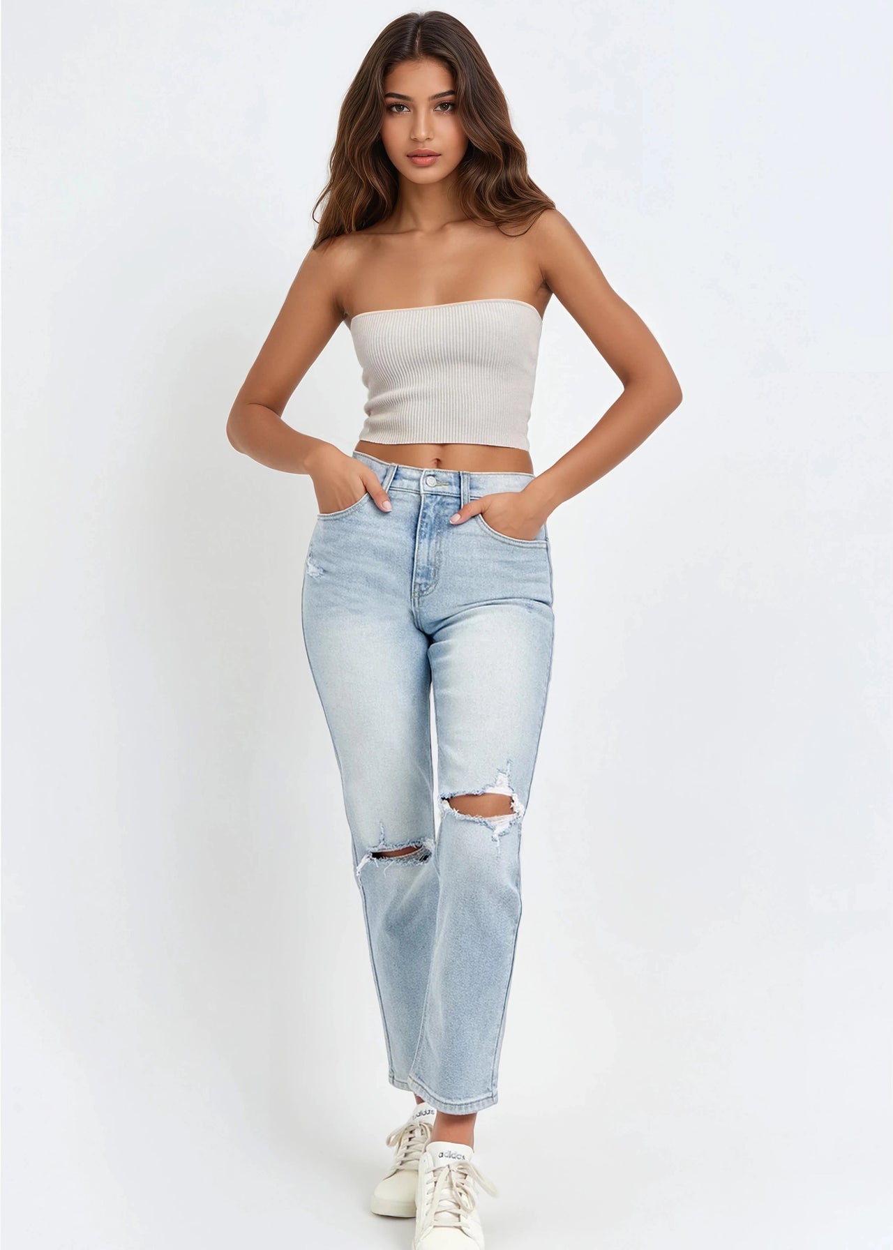 Light blue distressed straight-leg denim with high-rise fit.