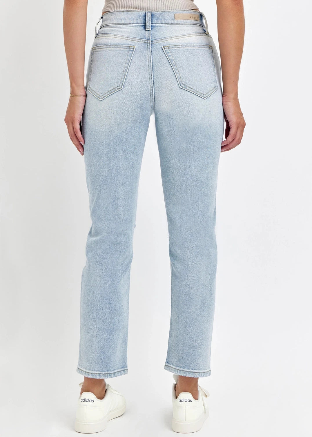Light blue distressed straight-leg denim with high-rise fit.