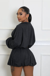 Thumbnail for Chic black windbreaker crop jacket and bubble skirt outfit, ideal for a day out with friends or everyday wear. Ideal for teenagers or young women. Side view.