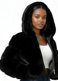 Thumbnail for Woman wearing a black fur-lined jacket on a white background