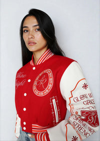 Thumbnail for Cropped varsity jacket with empowering embroidery and bold streetwear style.