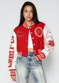 Thumbnail for Cropped varsity jacket with empowering embroidery and bold streetwear style.