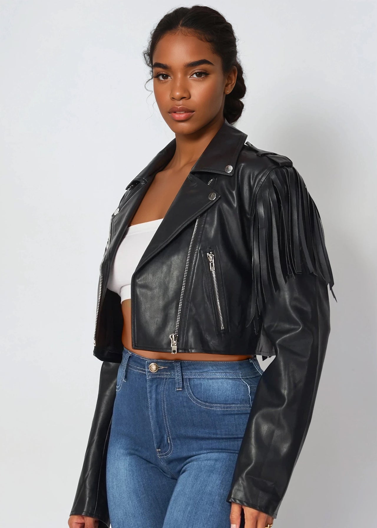 Cropped faux leather fringe jacket for bold, confident style.
