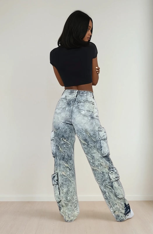 Y2k inspired mid rise, cargo style, wide leg pants for young women and teens. Back view.