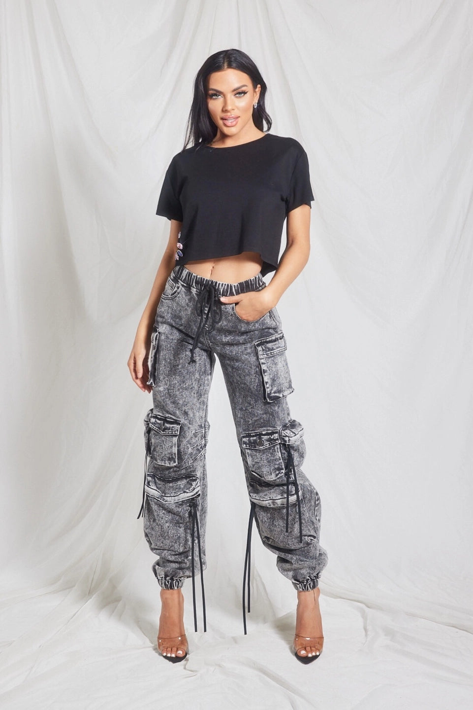 Stylish Black Cargo Pants young ladies and teenagers. Ideal for everyday look. Front view.