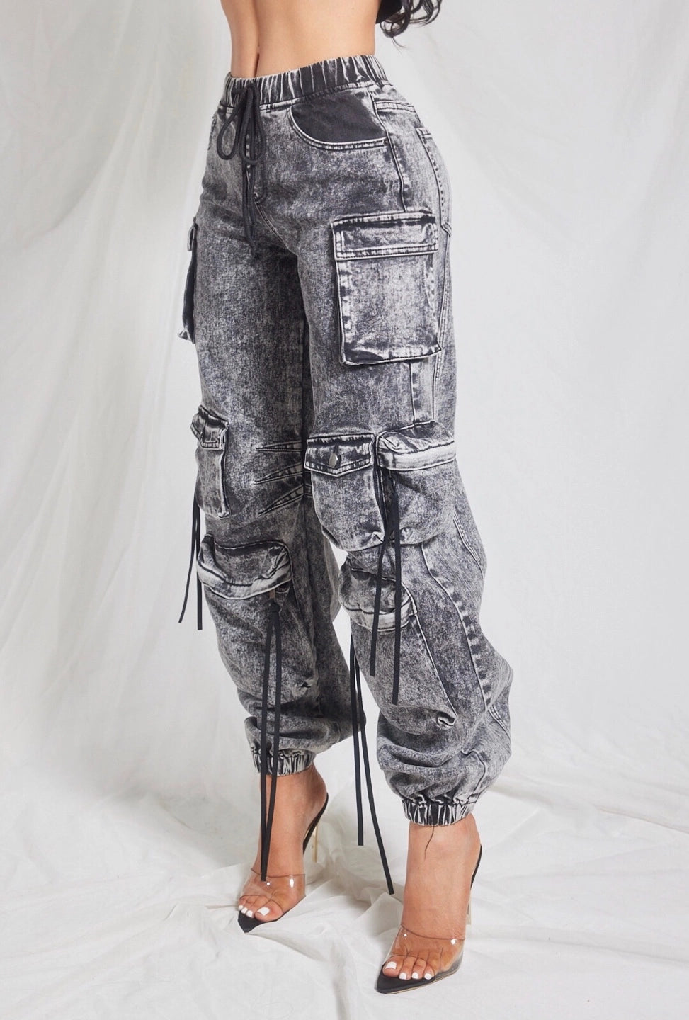 Stylish Black Cargo Pants young ladies and teenagers. Ideal for everyday look.  Side view.