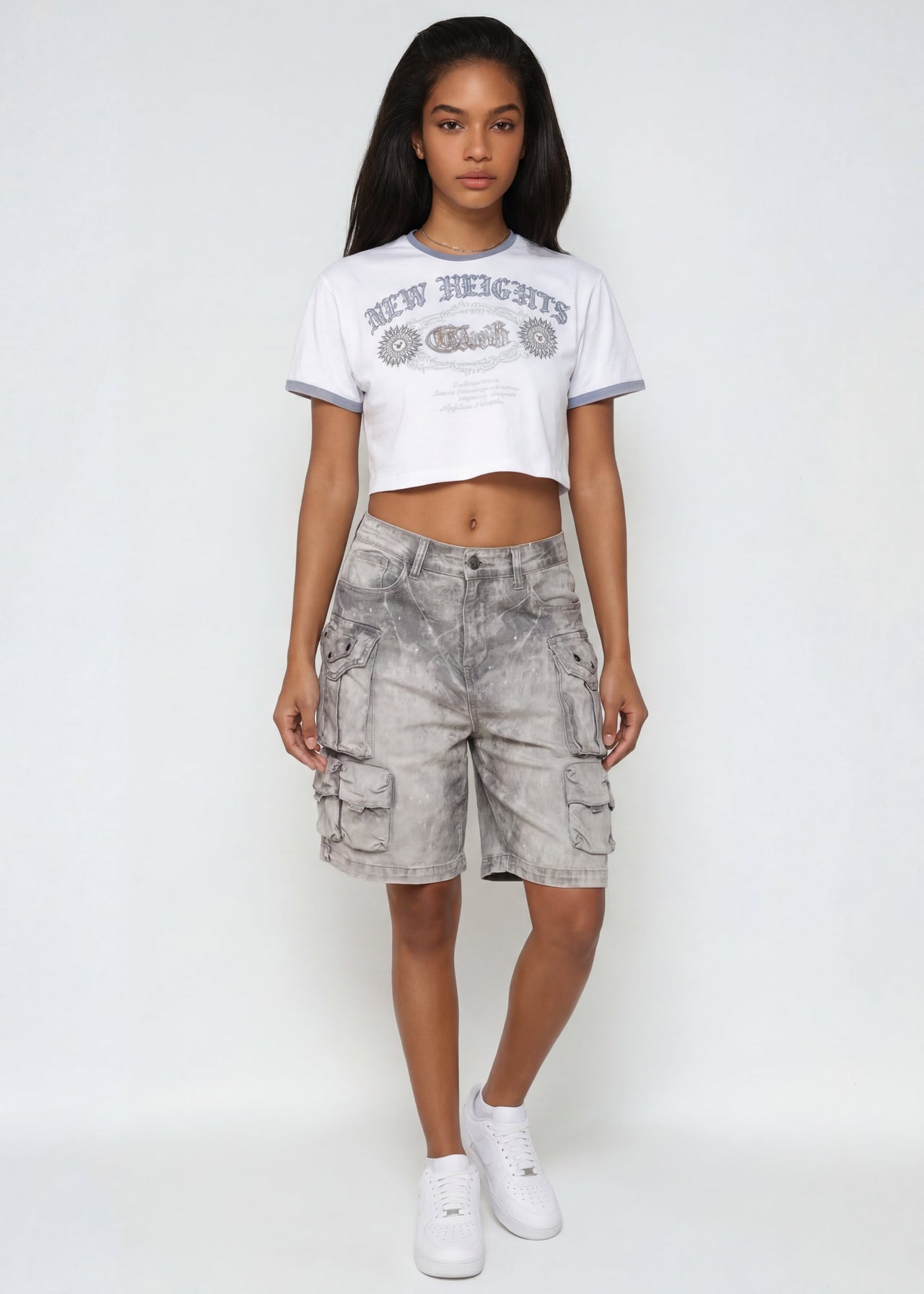 Women wearing Grey Cargo Shorts with a relaxed skater fit, utility cargo pockets, and durable fabric for everyday wear.