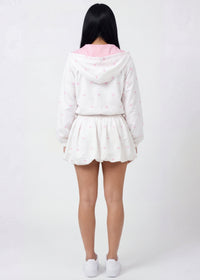 Thumbnail for Pink Seal Chic ruffle crop windbreaker and bubble skort in coquette print.