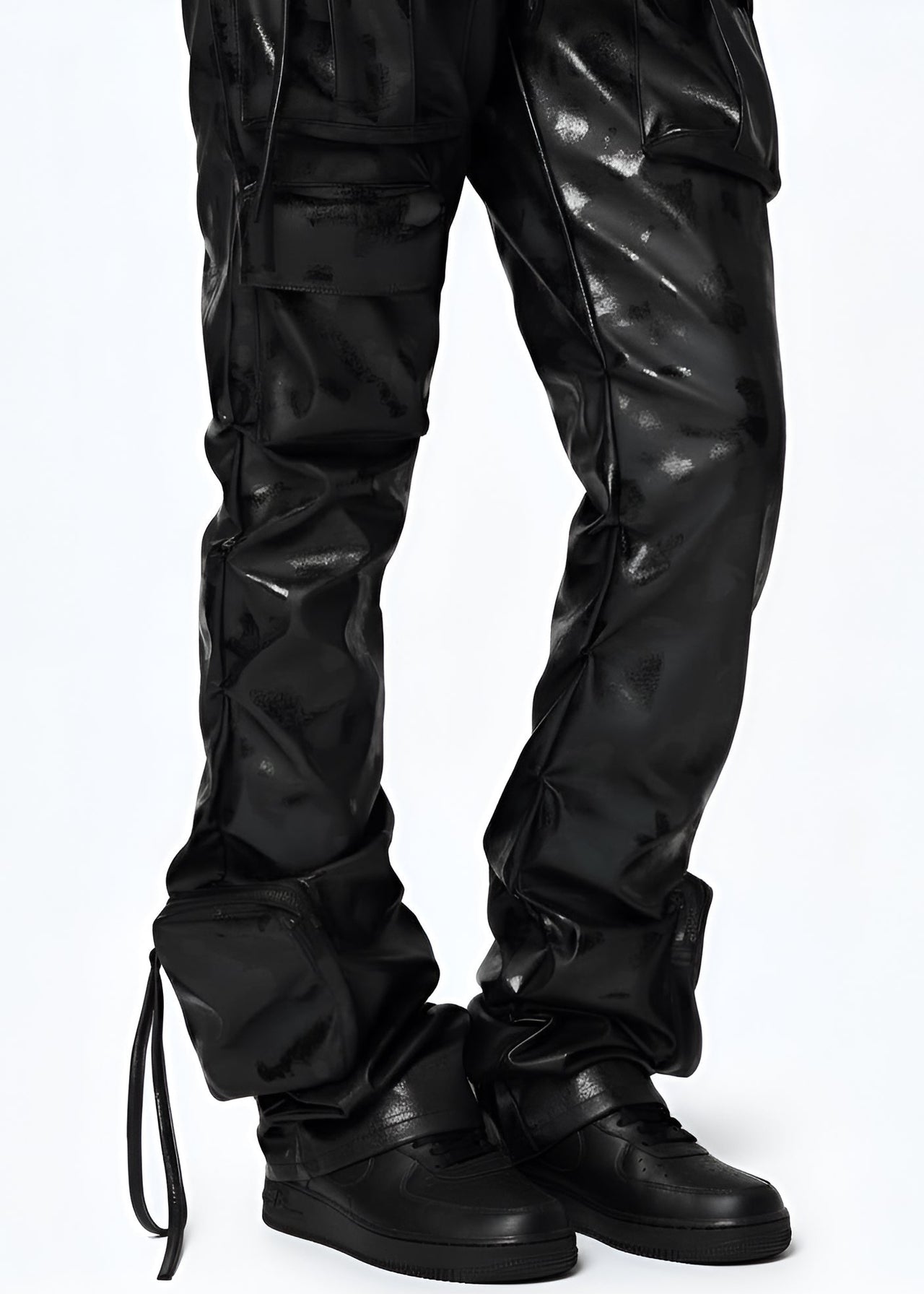 Young women wearing Pink Seal Glossy PU black leather stacked cargo pants with side pinching and pockets.