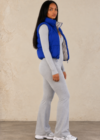 Thumbnail for lady wearing navy blue vest with grey jumpsuit