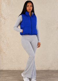 Thumbnail for lady wearing navy blue vest with grey jumpsuit