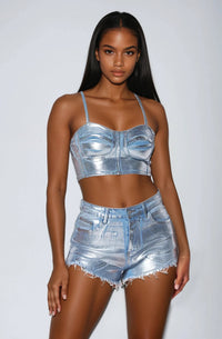 Thumbnail for The No Limits Metallic Crop Top & Jean Shorts Outfit features a metallic foil finish crop bustier top with a back zipper and high-rise button-front shorts, perfect for stylish streetwear.