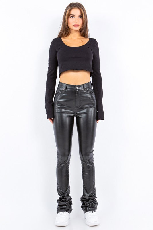 Trendy Faux Leather Black Stacked Pants for young women and teenagers in black. Y2K streetwear for everyday wear. Full view.