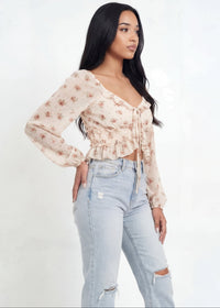 Thumbnail for Pink seal floral blouse and light blue jeans on a white background