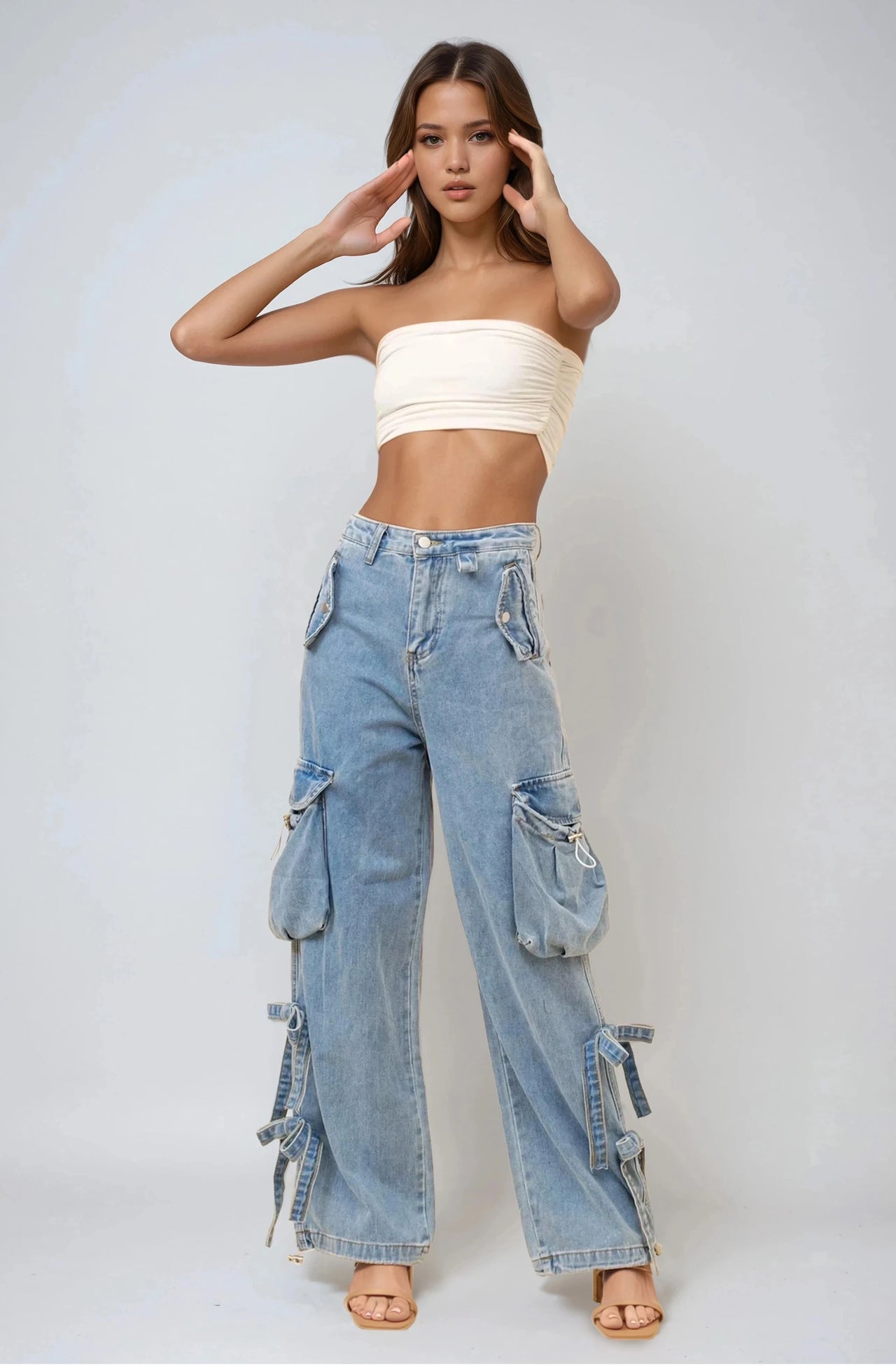 Pink Seal Blue Aura Mid Rise soft-washed baggy denim cargo pants with utility pockets and bows