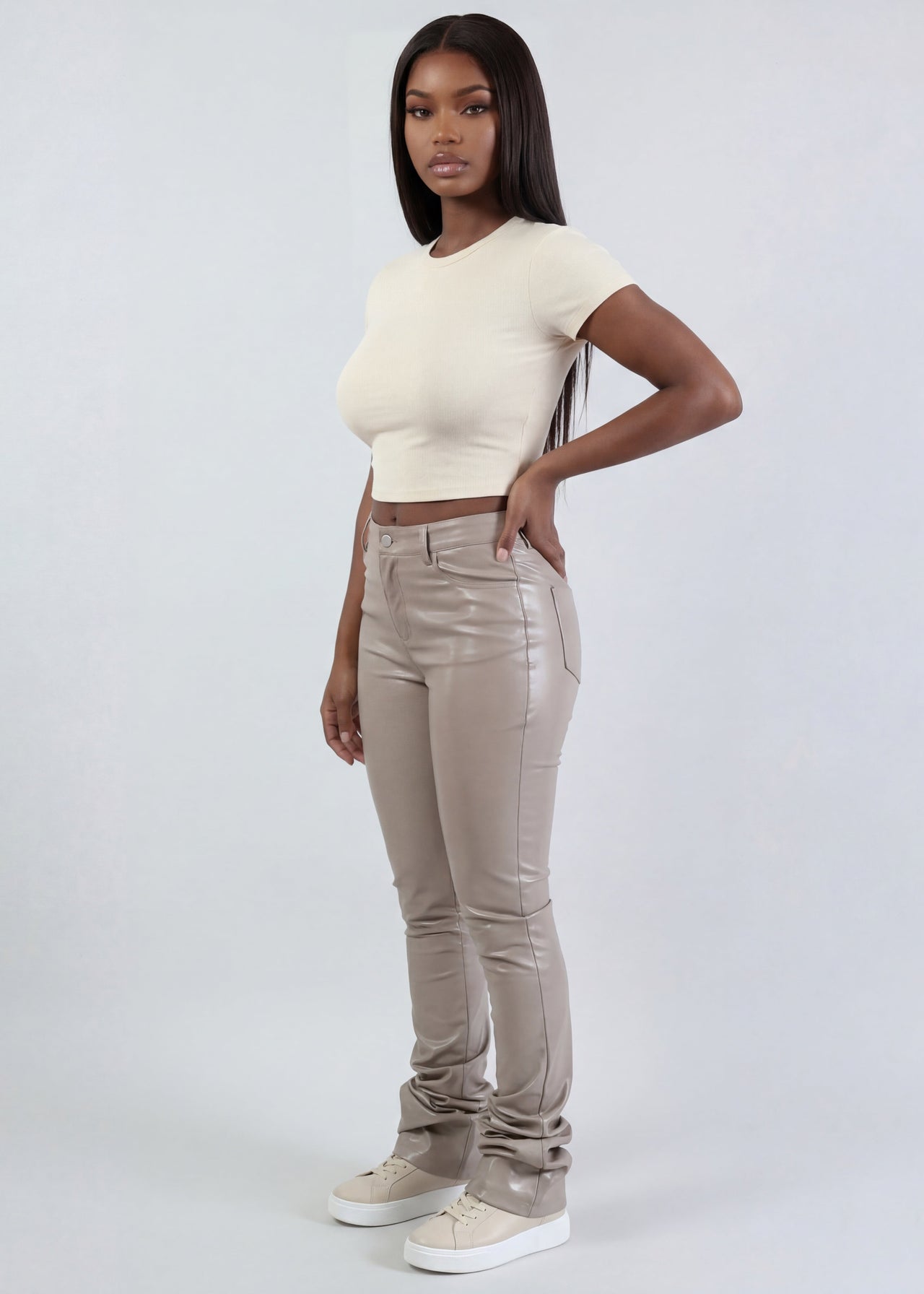 women wearing Pink Seal tan leather pants