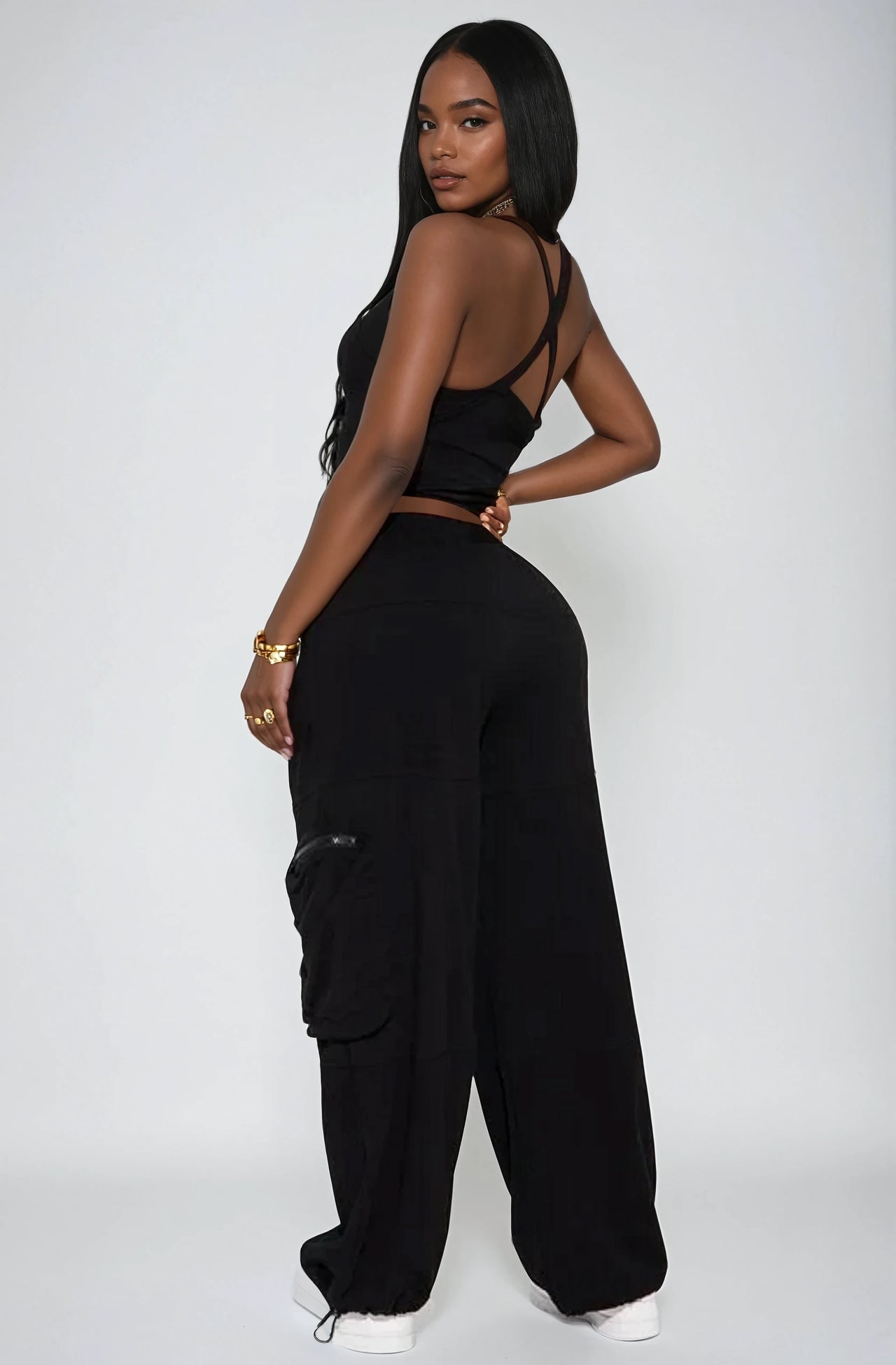 Bold & laid-back. V-neck crop top and cargo pants with utility details for confident everyday streetwear.