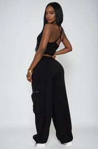 Thumbnail for Bold & laid-back. V-neck crop top and cargo pants with utility details for confident everyday streetwear.