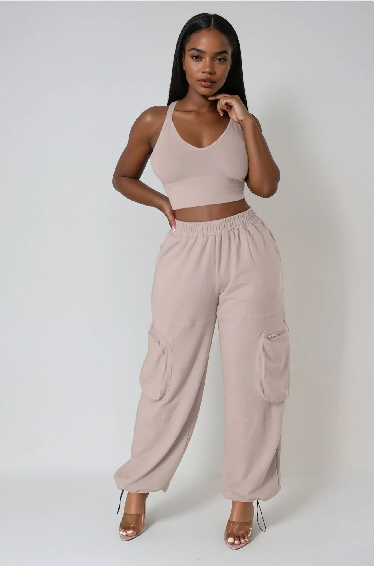 Bold & laid-back. V-neck crop top and cargo pants with utility details for confident everyday streetwear.
