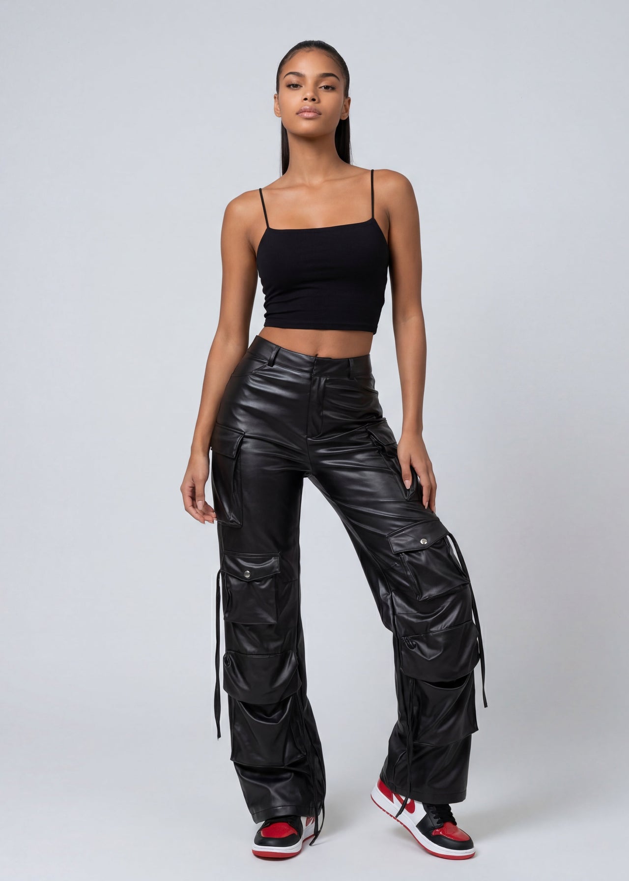 Pink Seal Wide-leg high waist PU leather pants with bold structured silhouette.