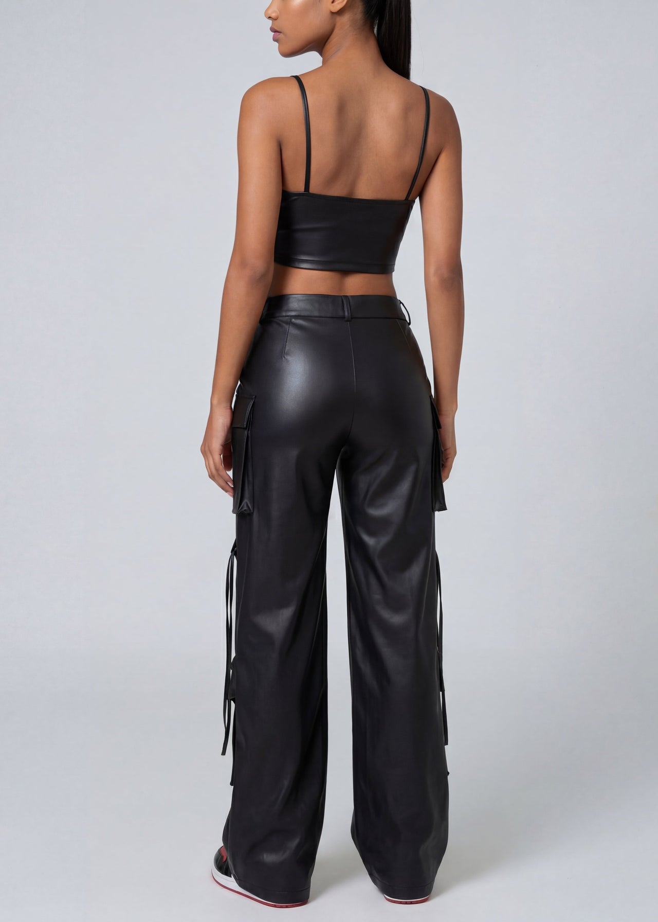 Pink Seal Wide-leg high waist PU leather pants with bold structured silhouette.