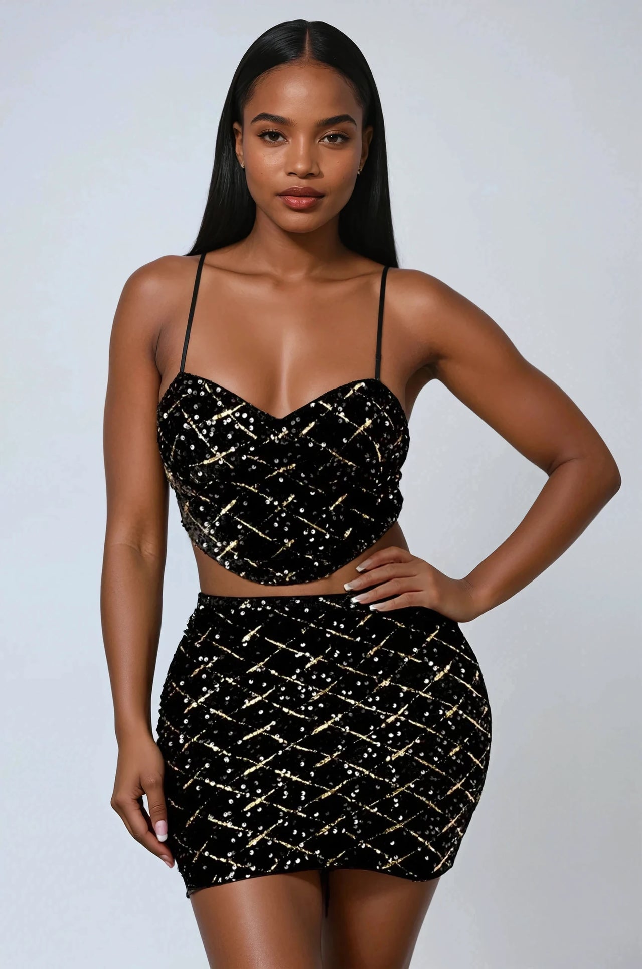 The Relentless Glow Sequin Bustier & Skirt Set dazzles with diamond sequins, velvet fabric, and a sultry fit, making it the perfect choice for night outs & celebrations.