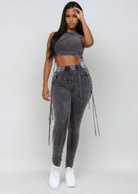 Thumbnail for Black The Rock Solid Mineral Wash Two-Piece Outfit features a trendy mineral wash design with bold drawstring details along the sides, blending casual comfort with a standout look. Perfect for streetwear, casual wear, and travel outfits. Shop now at Pink Seal!