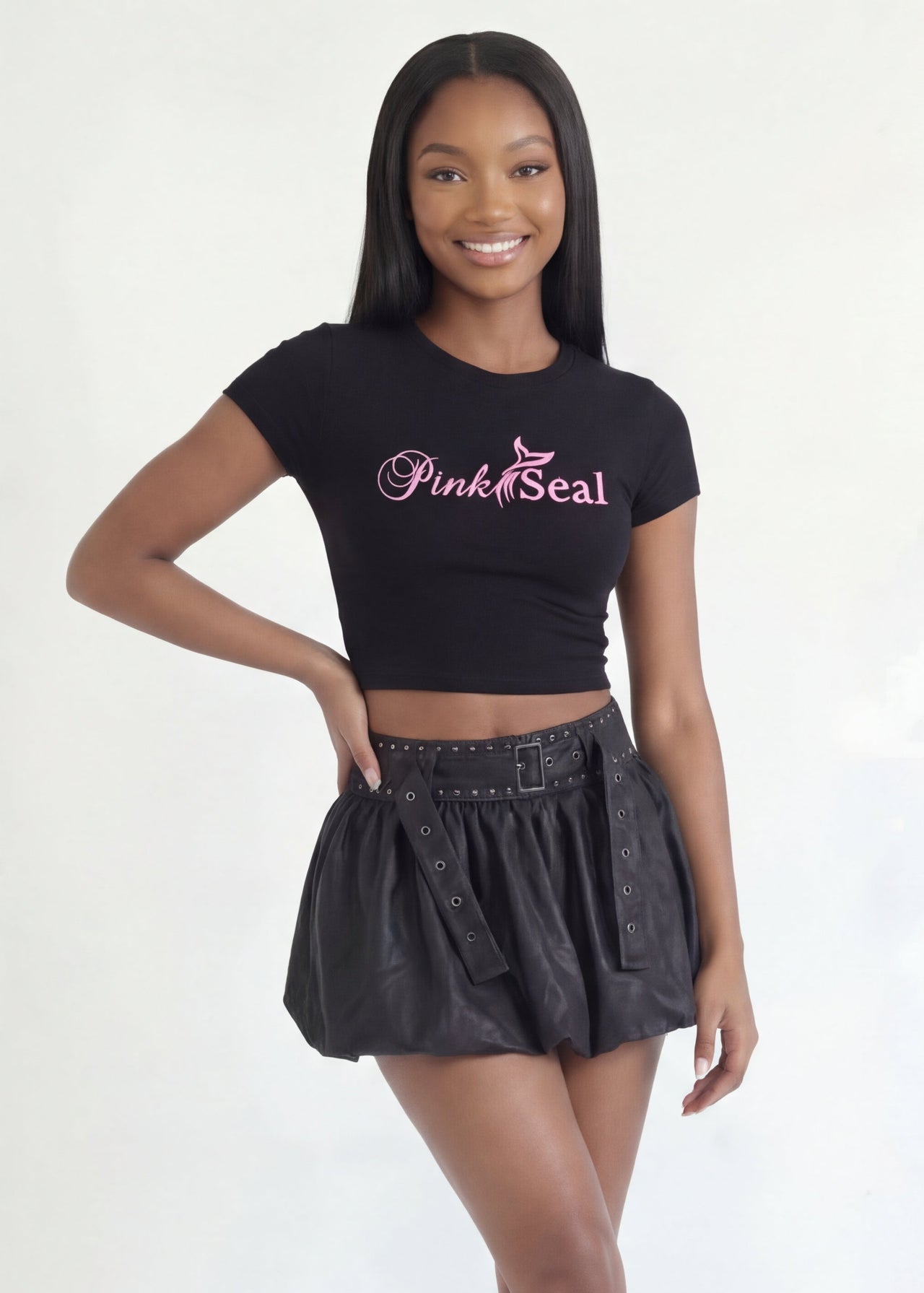 Pink Seal Short vegan leather bubble skirt with Pink Seal Cropped top and bold sculptural silhouette.