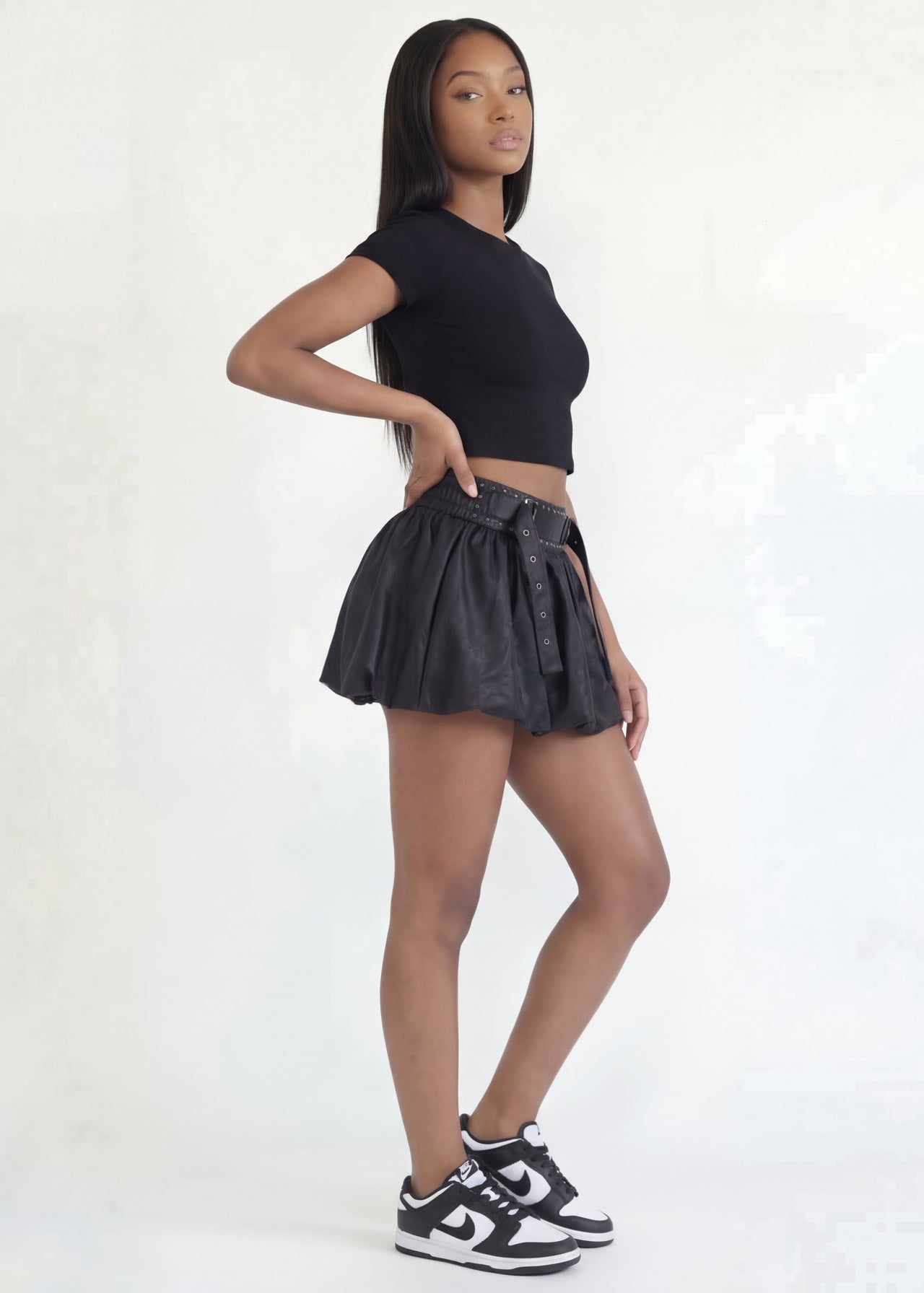 Pink Seal Short vegan leather bubble skirt with bold sculptural silhouette.