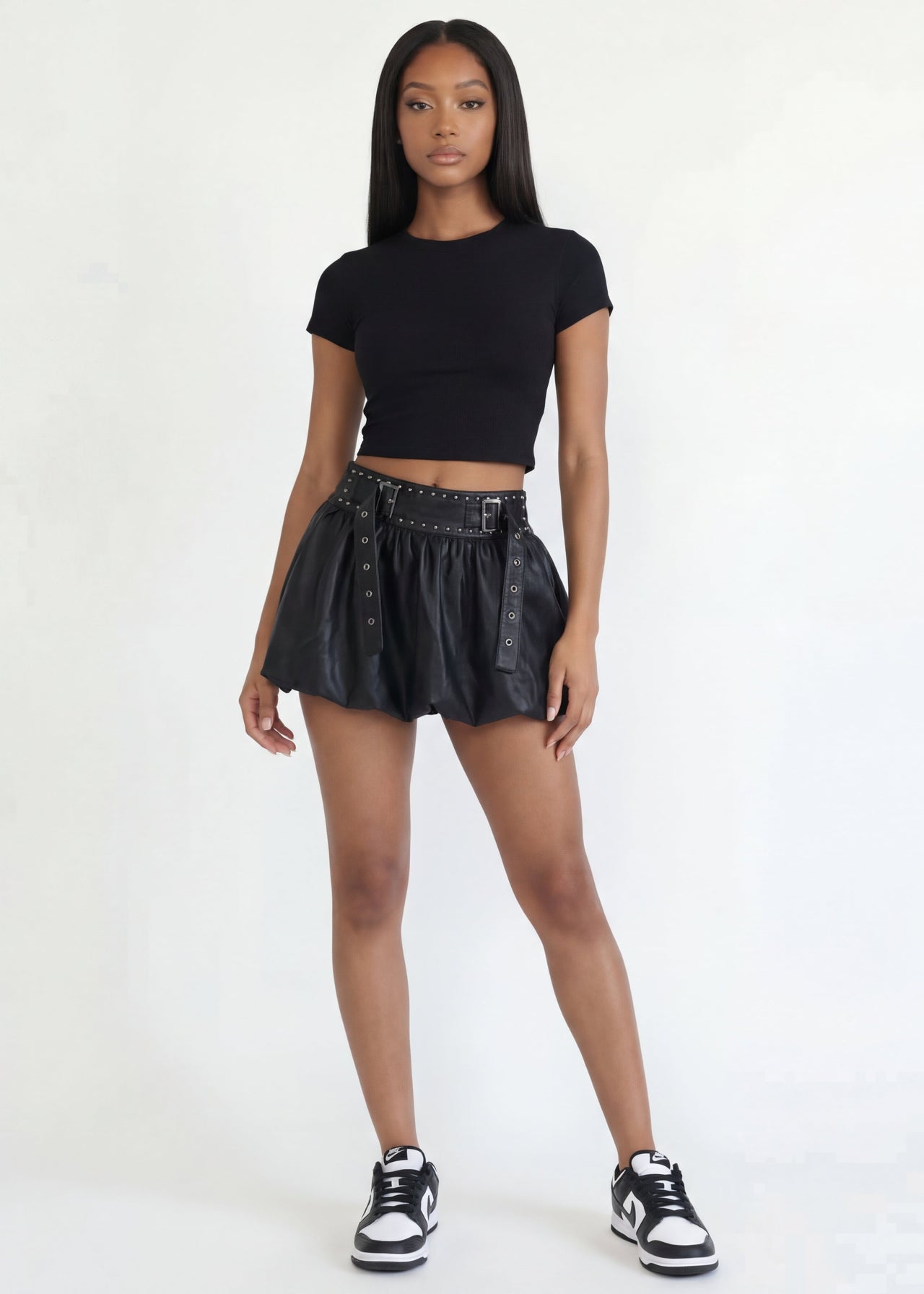 Pink Seal Short vegan leather bubble skirt with bold sculptural silhouette.