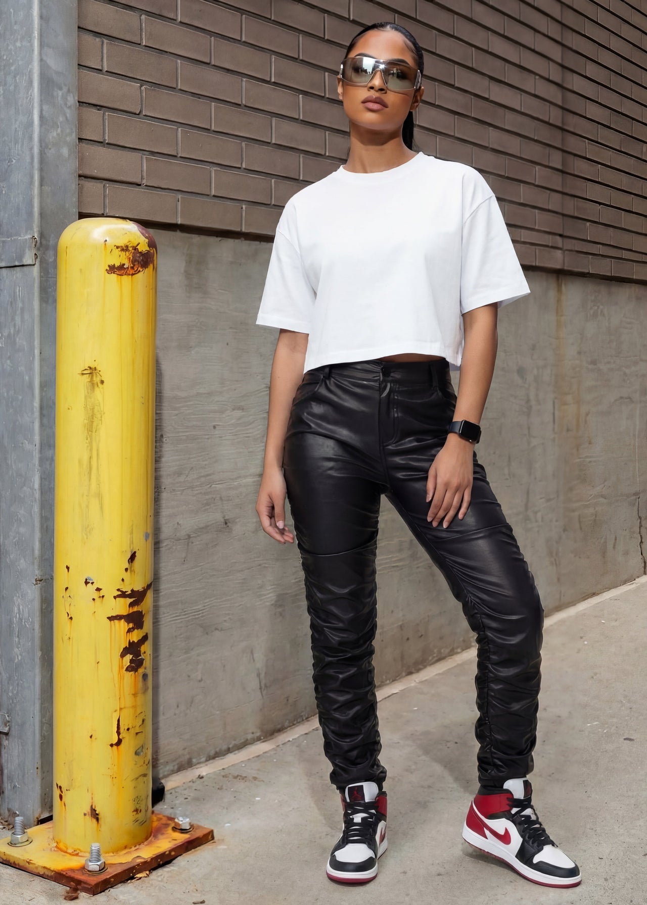 Pink Seal High-rise thick PU leather pants with ruched detailing.