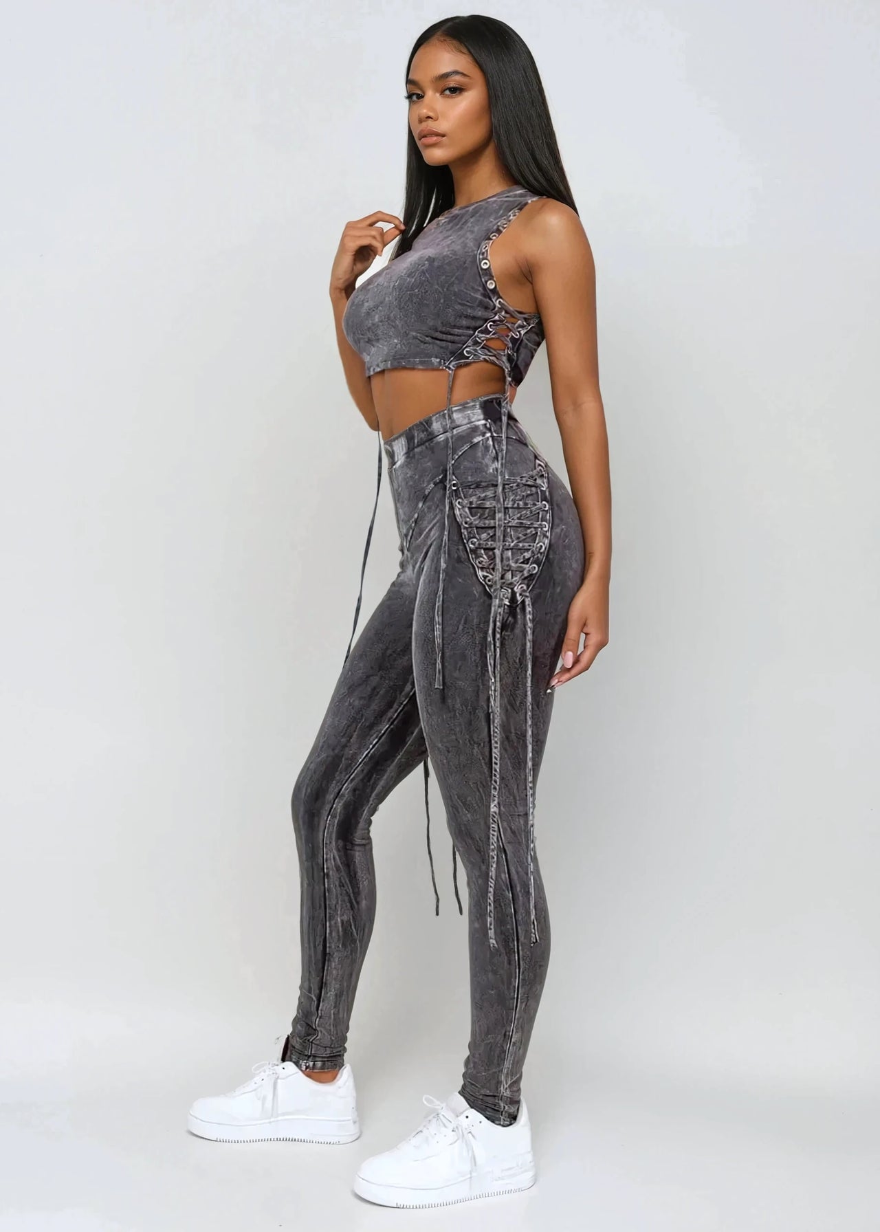 Black The Rock Solid Mineral Wash Two-Piece Outfit features a trendy mineral wash design with bold drawstring details along the sides, blending casual comfort with a standout look. Perfect for streetwear, casual wear, and travel outfits. Shop now at Pink Seal!