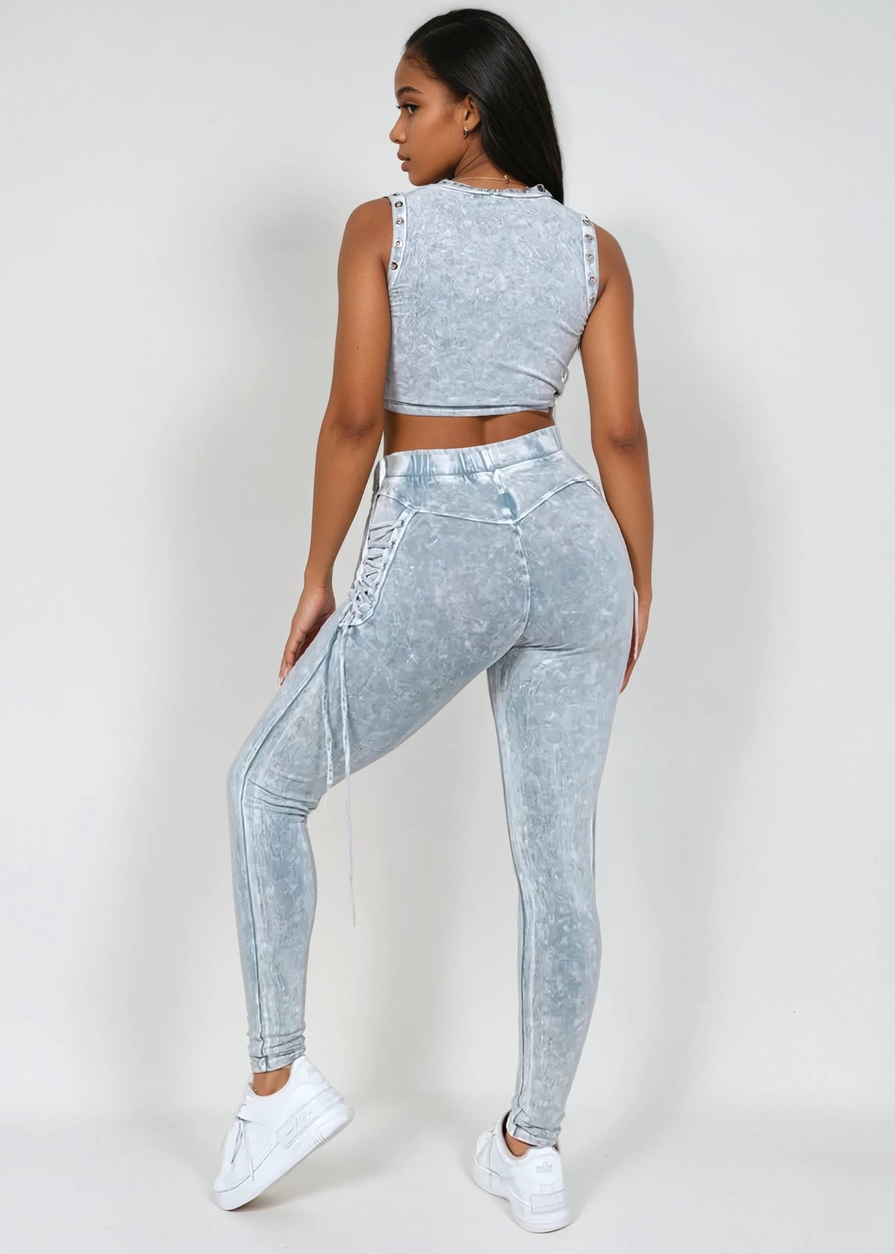Blue The Rock Solid Mineral Wash Two-Piece Outfit features a trendy mineral wash design with bold drawstring details along the sides, blending casual comfort with a standout look. Perfect for streetwear, casual wear, and travel outfits. Shop now at Pink Seal!