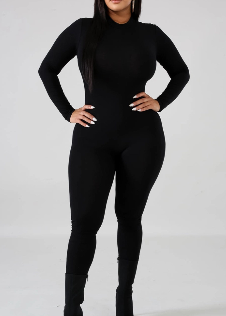 Chic black one piece jumpsuit for a young women for Spring, Fall, and Winter fashion.
