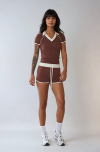Thumbnail for The Weekend Stride Short Sleeve Top & Shorts Set combines soft jersey fabric, two-tone stripes, and a fitted silhouette for a sporty, comfortable style.
