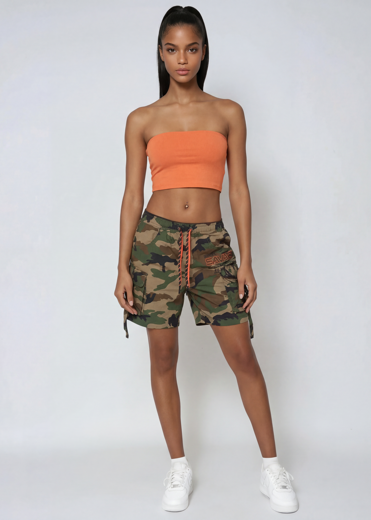 Pink Seal Women's Nylon Camo Shorts, featuring utility slouch fit, cargo pockets, double drawstrings & stretchy nylon fabric.
