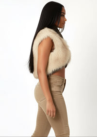 Thumbnail for Woman wearing a Cropped faux fur vest with shawl collar and ribbed knit base.