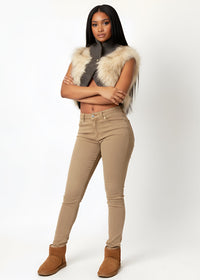 Thumbnail for Woman wearing a Pink Seal Cropped faux fur vest with shawl collar and ribbed knit base.
